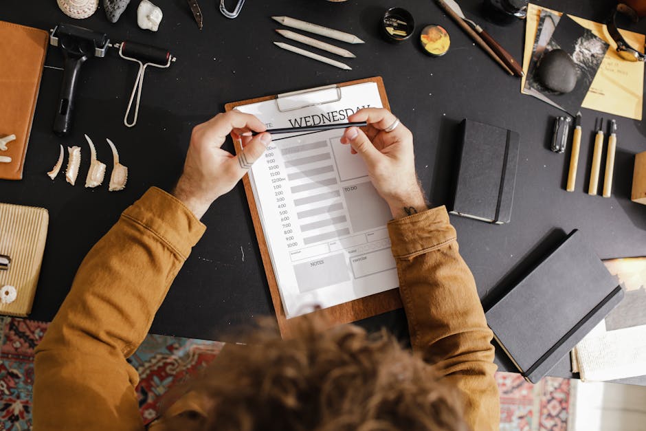 Smiling event planner organizing details with a clipboard